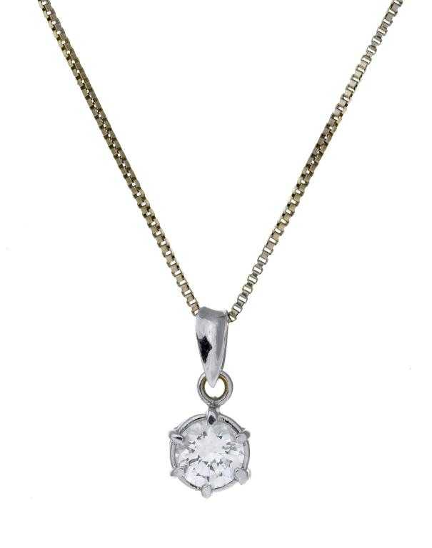 Appraisal: A DIAMOND PENDANT with a round brilliant cut diamond in