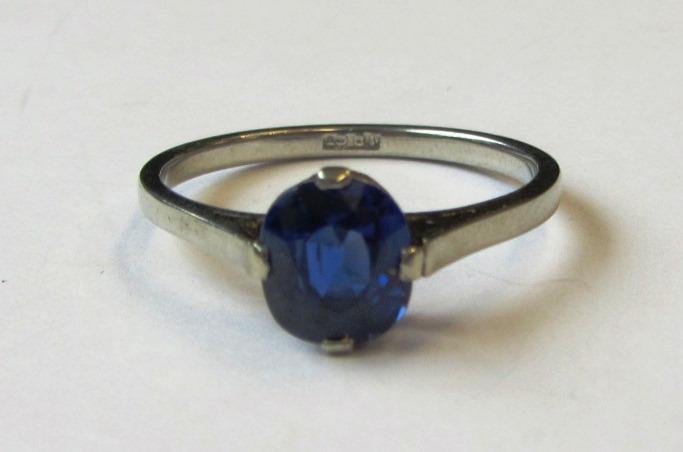 Appraisal: A white gold and sapphire set single stone ring mounted