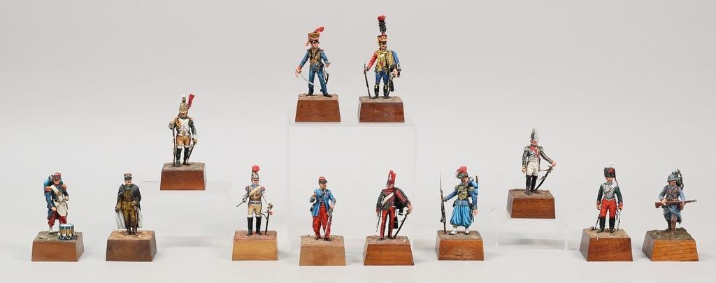 Appraisal: Keith Wippler hand painted metal toy soldier figures on wooden