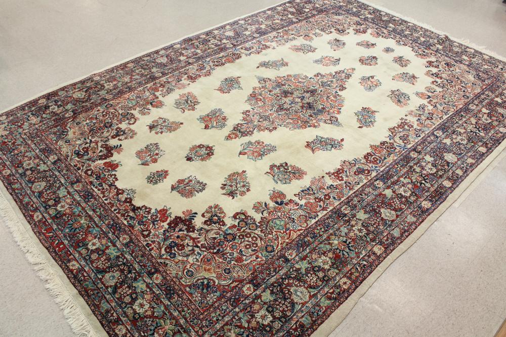 Appraisal: HAND KNOTTED PERSIAN KERMAN CARPET central floral medallion and floral