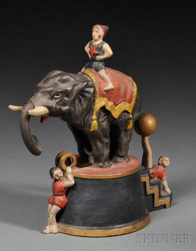 Appraisal: Polychrome Painted Cast Iron Elephant and Three Clowns Bank J