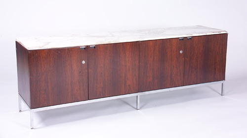 Appraisal: KNOLL Rosewood credenza with white marble top and four doors