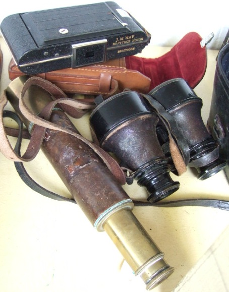 Appraisal: A brass and leather bound two drawer telescope by C