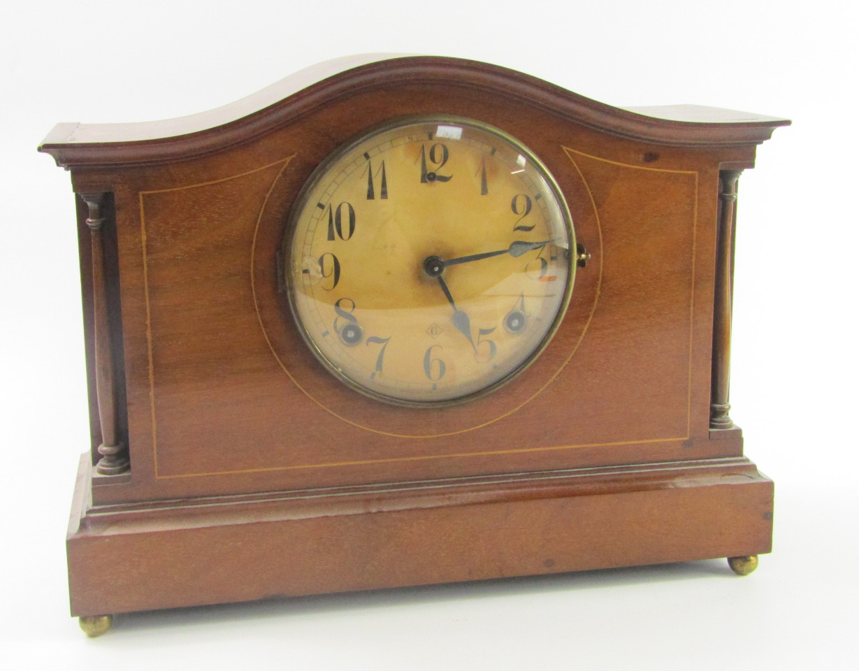 Appraisal: An Edwardian mahogany and boxwood line inlaid mantel clock of