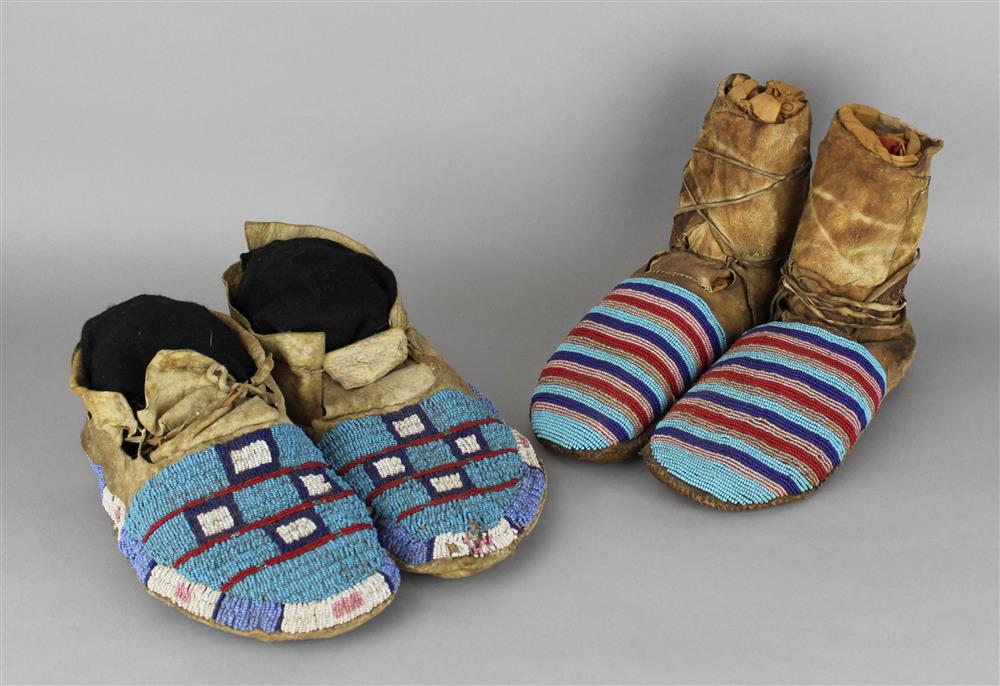 Appraisal: TWO PAIRS OF NATIVE AMERICAN BEADED HIDE MOCCASINS Provenance a