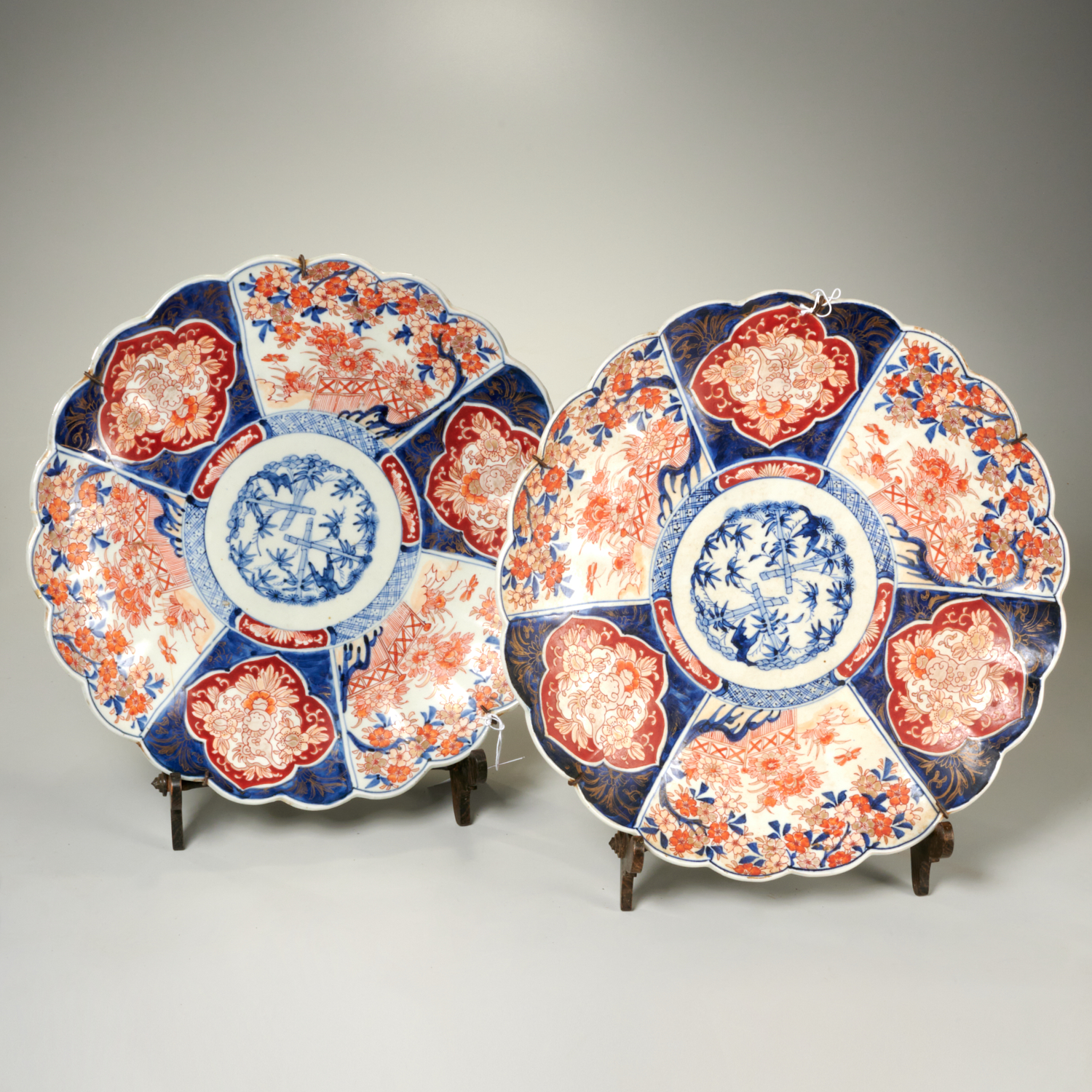 Appraisal: PAIR ANTIQUE JAPANESE IMARI CHARGERS Likely th c each with