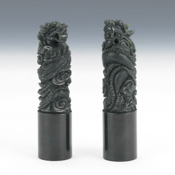 Appraisal: PAIR OF CARVED JADE CHOPS Pair of carved spinach jade