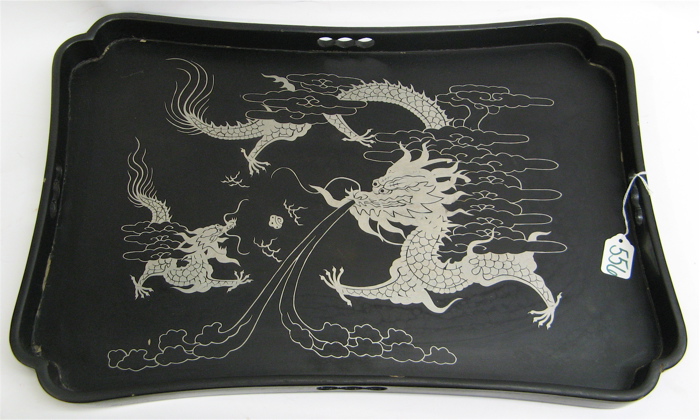 Appraisal: A JAPANESE LACQUER SERVING TRAY having silver Asian motif stylized