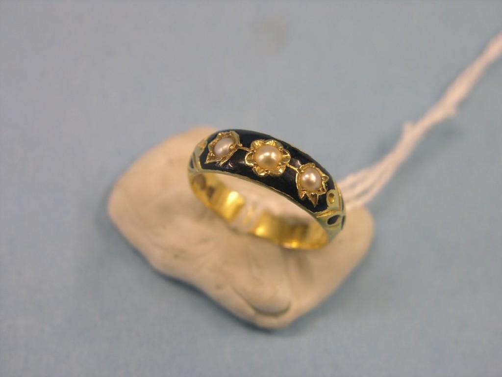 Appraisal: An ct gold seed pearl and black enamel ring three