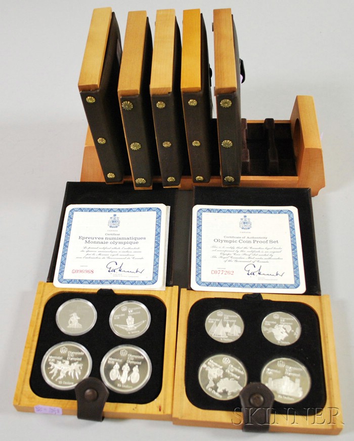 Appraisal: Winter Olympic Sterling Silver Coin Set seven cased sets each