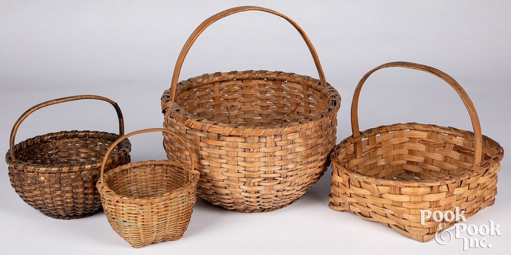 Appraisal: Four splint gathering baskets th c Four splint gathering baskets