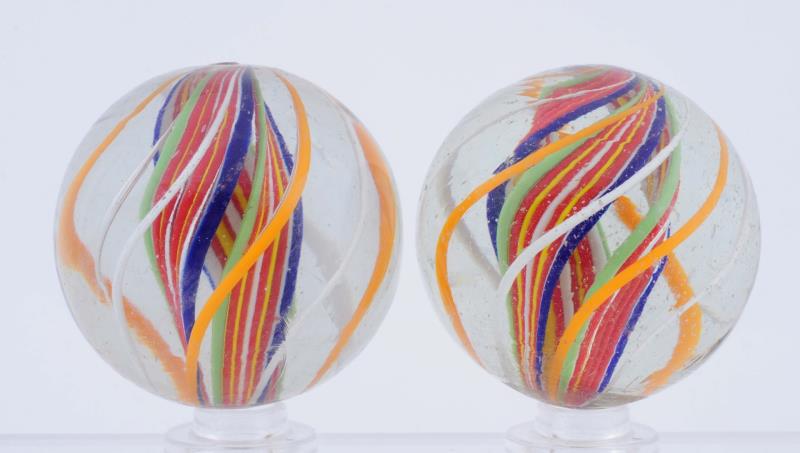 Appraisal: Lot Of Same Cane Lutz Swirl Marbles Great pair of