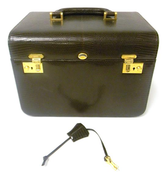 Appraisal: TEXTILE Gucci travel cosmetic case brown leather with scale motif