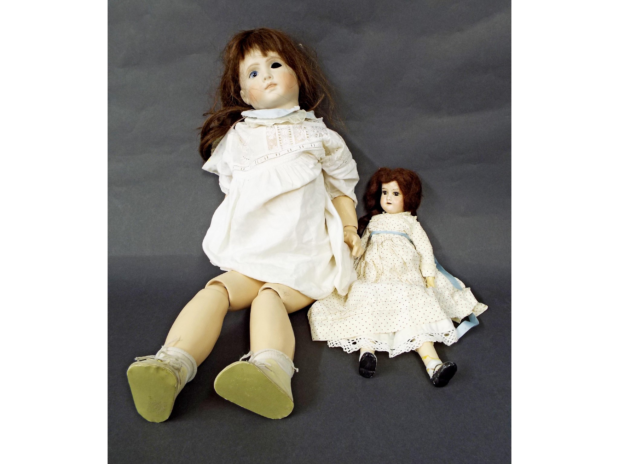 Appraisal: Large bisque-headed doll with articulated wooden limbs marked A T