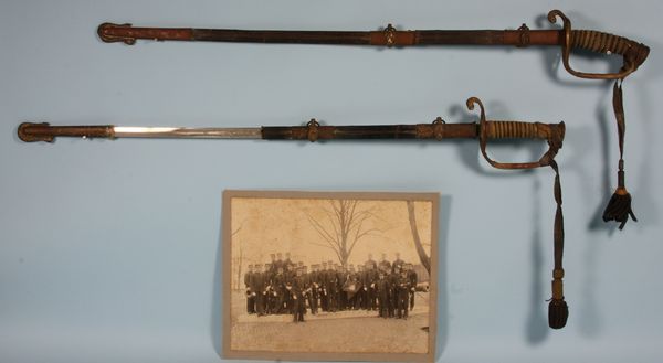 Appraisal: Two naval dress swords and one related photograph all formerly