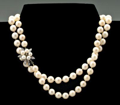 Appraisal: Pearl and diamond necklace knotted strand of cultured pearls to