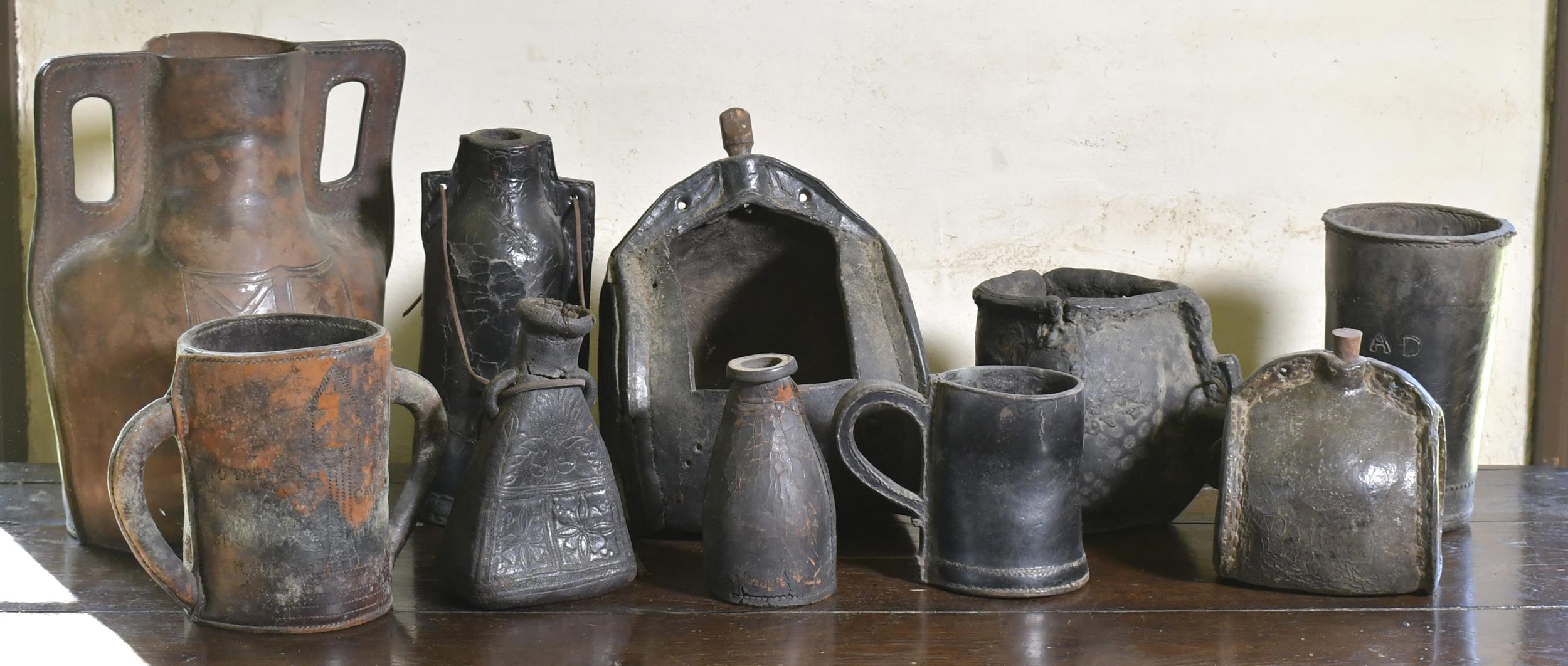 Appraisal: ASSORTED TH TH C LEATHER VESSELS Ten pieces of early