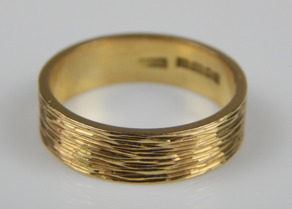 Appraisal: A wedding band bark finish ct gold Provenance Butterfields Thoresby