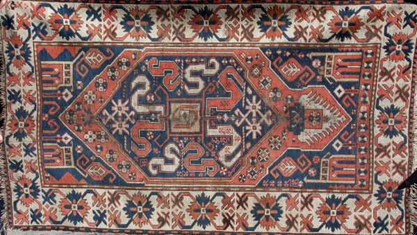 Appraisal: Antique Kazak rug ' x ' Wear and edge fraying