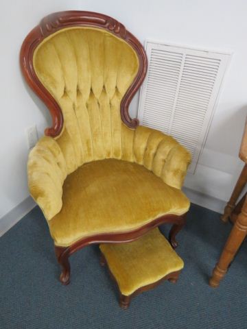 Appraisal: Carved Mahogany Parlor Chair with Stool tufted light green velvet