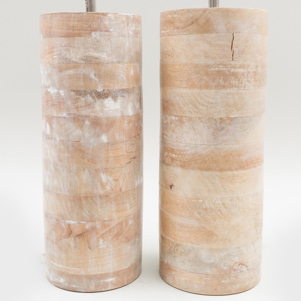 Appraisal: Pair of Cylindrical Wood Lamps in high to socket Condition