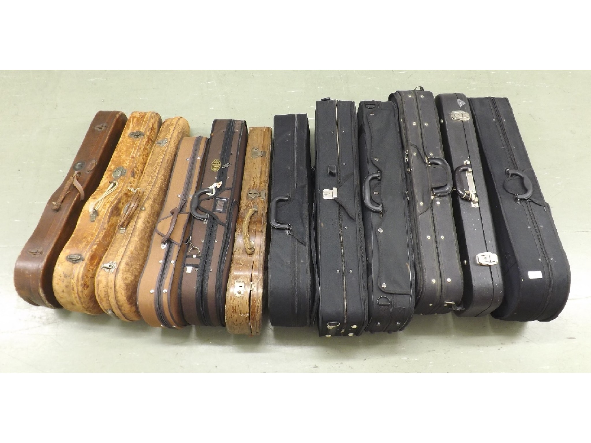 Appraisal: Twelve various violin cases