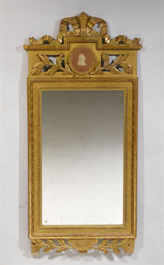 Appraisal: A MIRROR in Louis XVI style probably France Carved wood