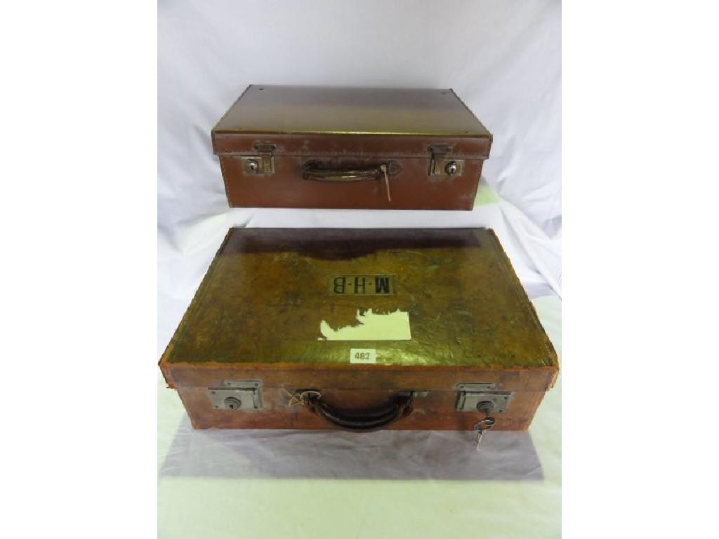 Appraisal: Two vintage suitcases one in leather