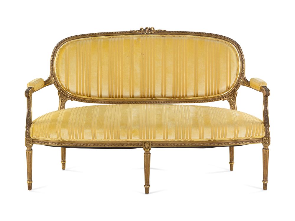 Appraisal: A Louis XVI Style Carved Giltwood Sofa A Louis XVI