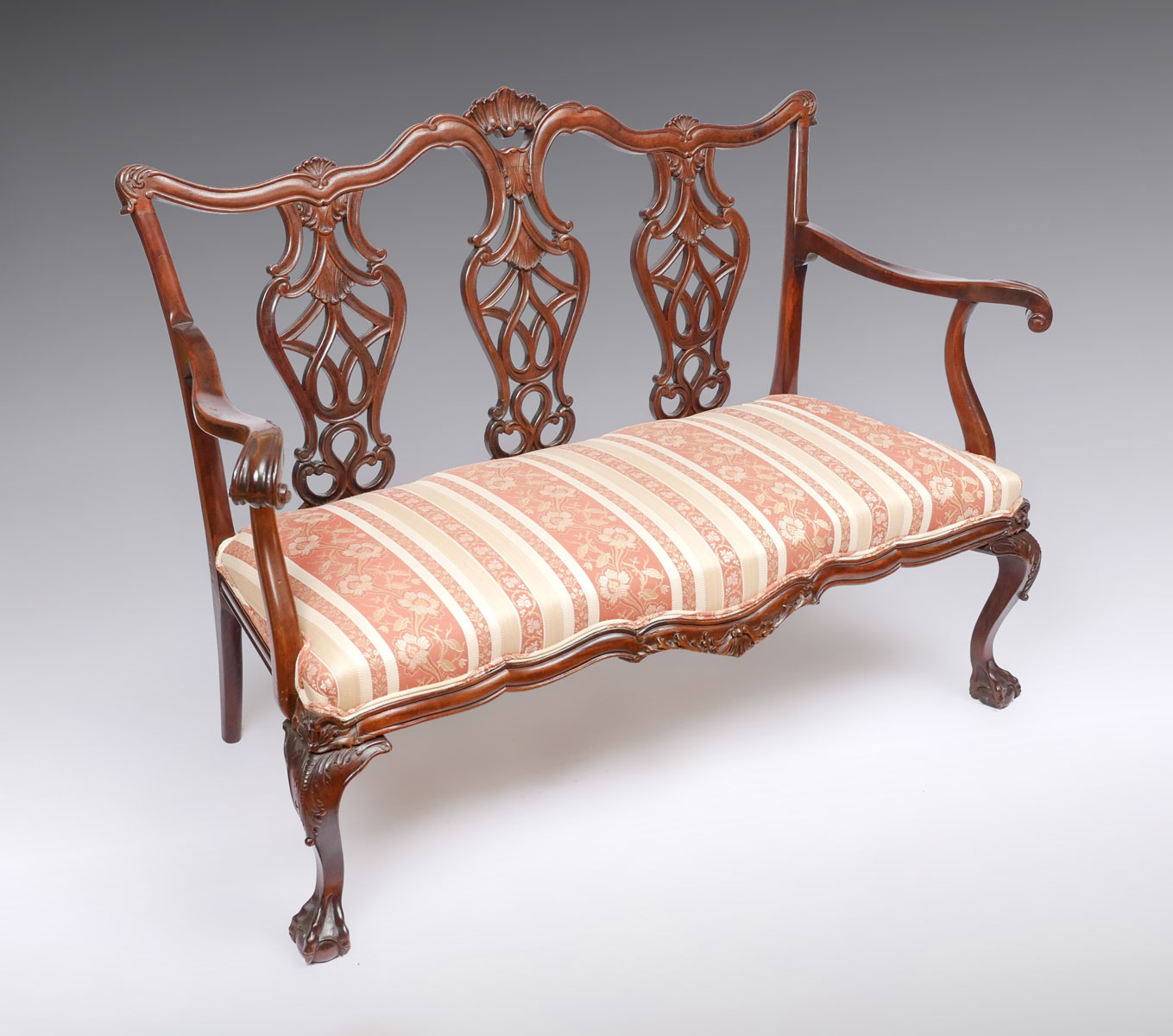 Appraisal: CHIPPENDALE CARVED SETTEE Carved Chippendale settee having a pierced triple