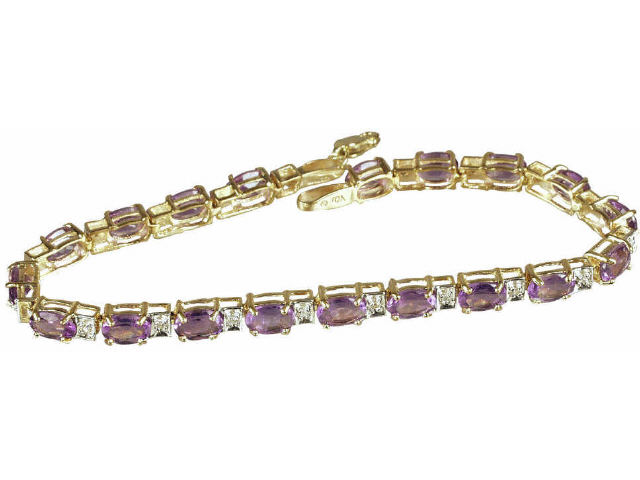 Appraisal: Vibrant ladies karat yellow gold bracelet set with fine oval