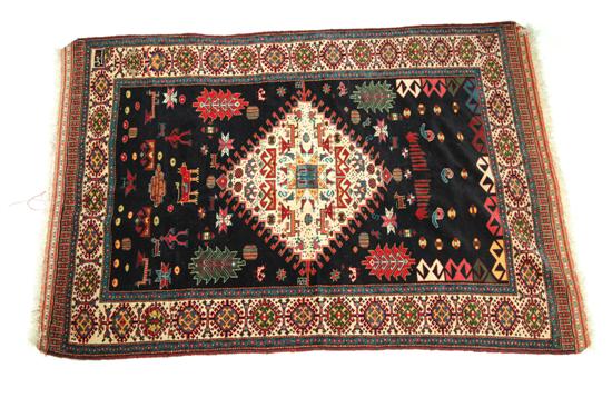 Appraisal: ORIENTAL RUG Twentieth century Quchan Ivory border and midnight blue