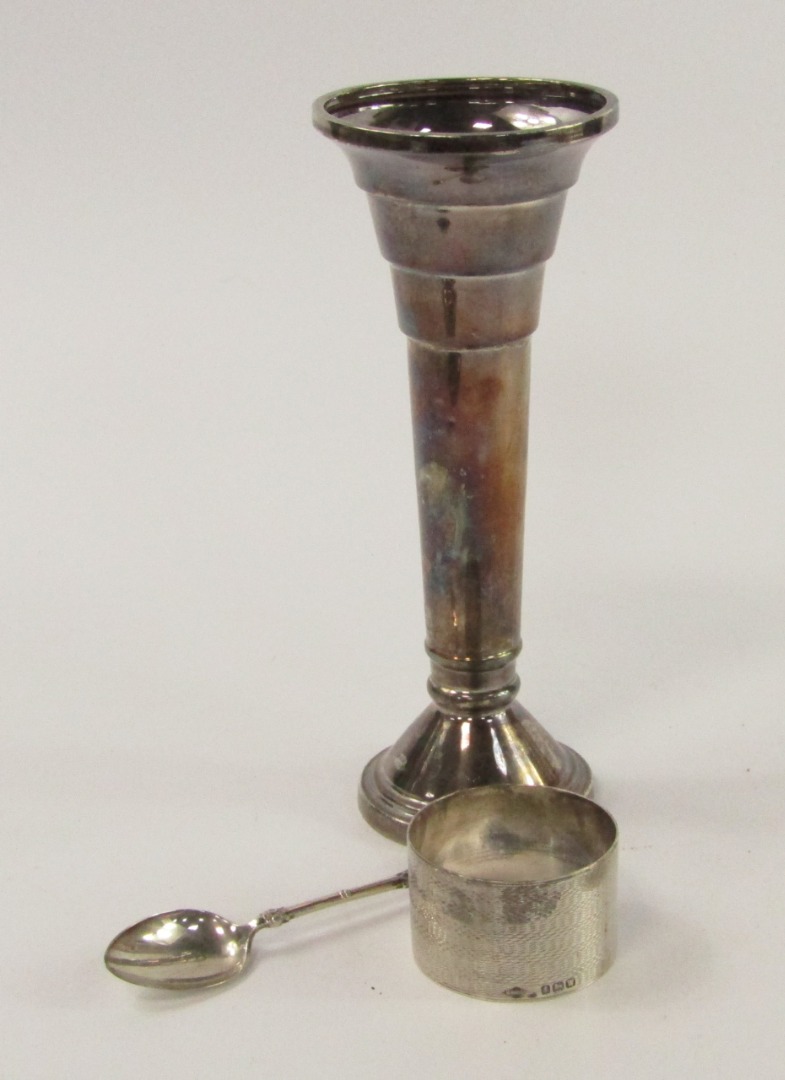 Appraisal: A George VI loaded silver bud vase Sheffield cm high