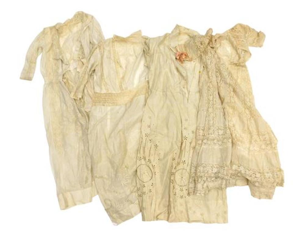 Appraisal: Four Edwardian cotton and lace dresses wear consistent with age