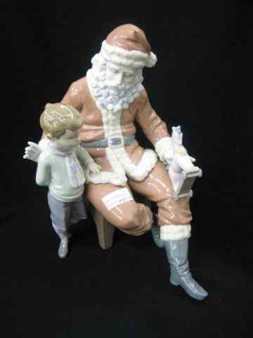 Appraisal: Lladro Porcelain Christmas Figurine santa with boy toy '' excellent