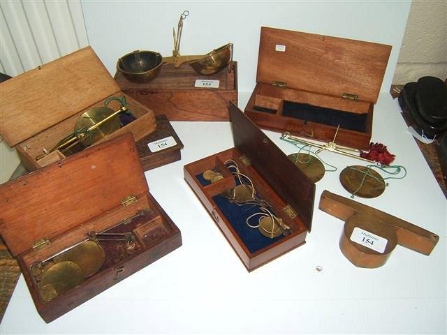 Appraisal: SEVEN VARIOUS MAHOGANY AND OAK CASED APOTHECARY'S AND COIN BALANCES