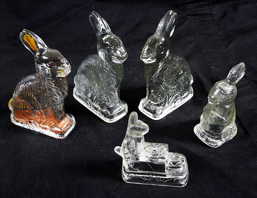 Appraisal: Rabbit Candy Containers Five rabbit candy containers the largest with