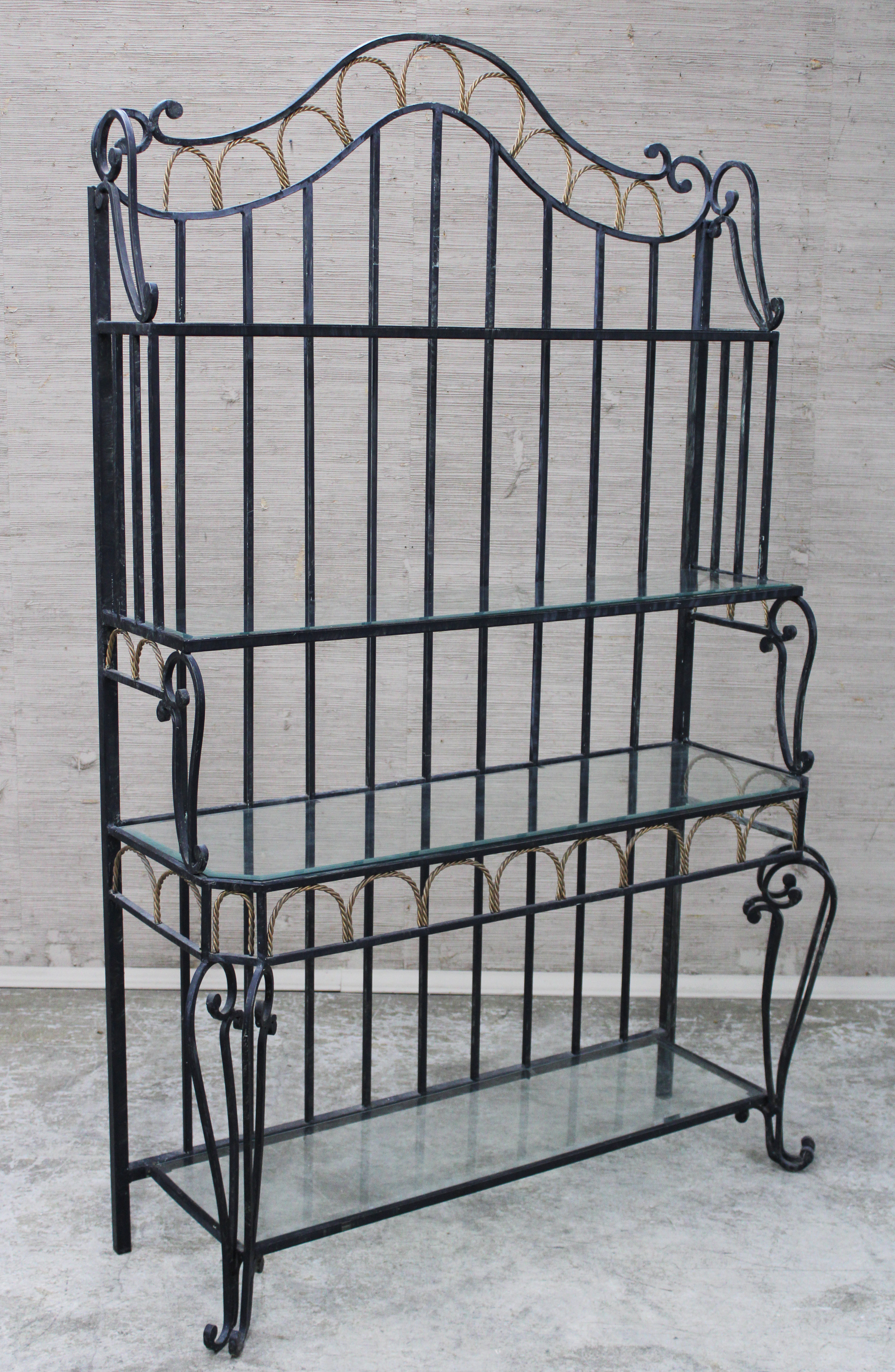 Appraisal: WROUGHT IRON BAKERS RACK Wrought iron bakers rack with glass