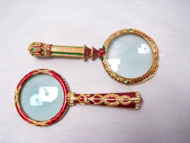 Appraisal: Two Edgar Berebi jeweled magnifiers both inches long and set