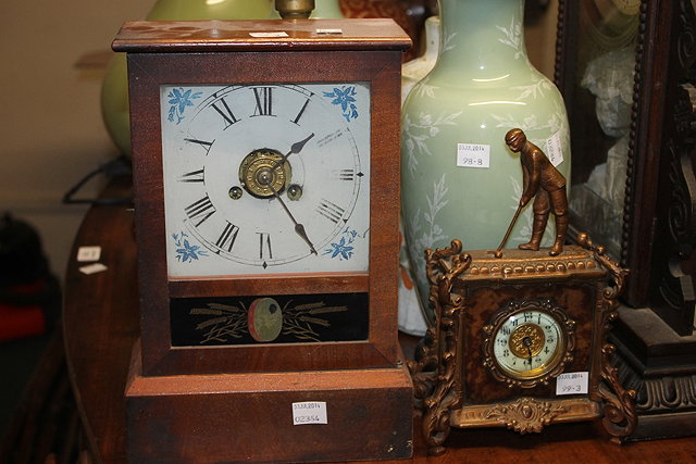 Appraisal: AN AMERICAN MANTEL CLOCK with carved case a smaller American