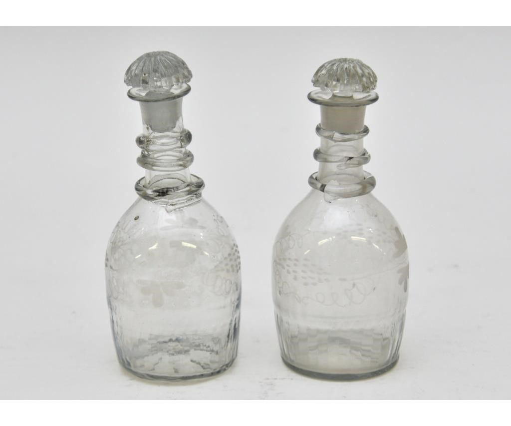 Appraisal: Pair of diminutive Georgian blown glass decanters each etched with