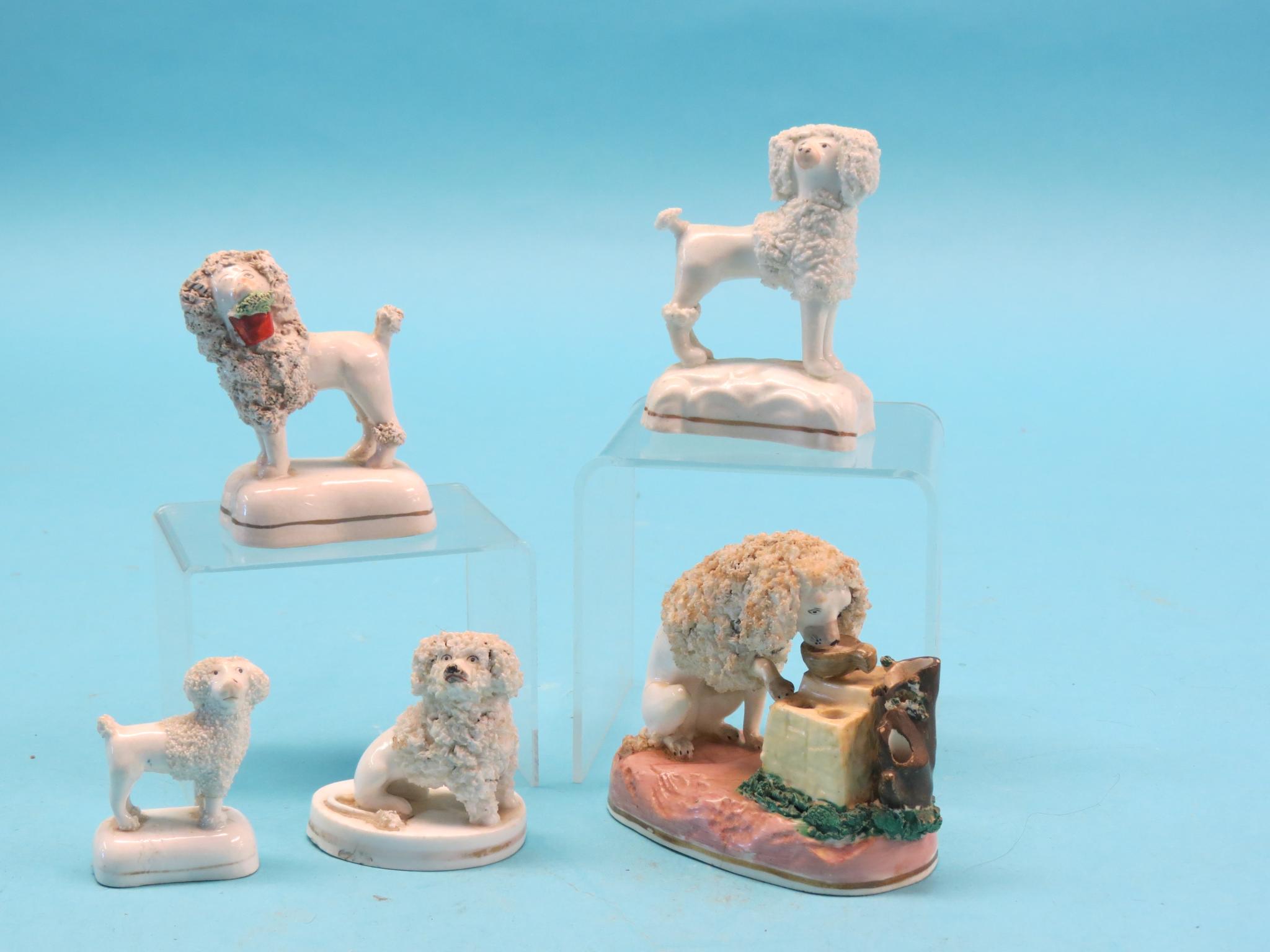 Appraisal: An unusual Victorian bone china drinking dog model and four