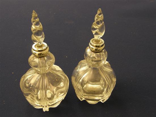 Appraisal: Pair of shaped glass perfume bottles with silver mounts London