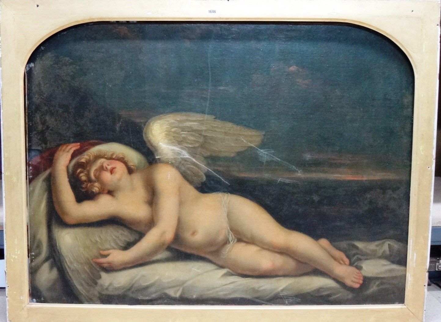 Appraisal: Follower of Guido Reni Reclining Cherub oil on canvas cm