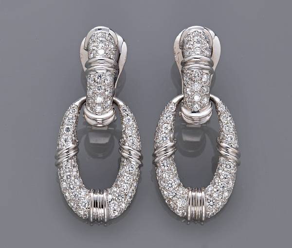 Appraisal: A pair of diamond earrings estimated total diamond weight for