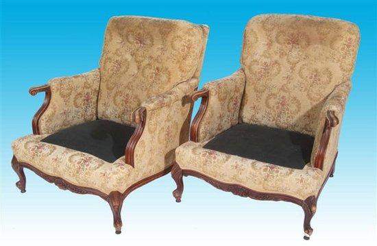 Appraisal: A pair of early th Century armchairs each with show-wood