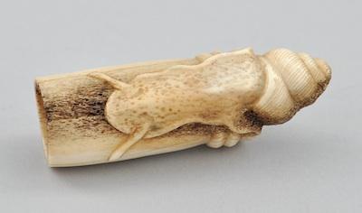 Appraisal: A Carved Antler Netsuke Depicting a Snail Carved antler netsuke