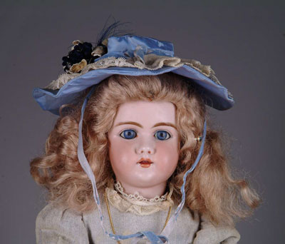 Appraisal: H HANDWERCK DOLL Blue glass sleep-eyed German open mouth on