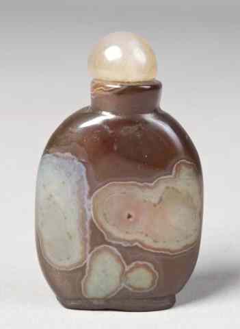 Appraisal: Chinese Carved Agate Snuff Bottlefinely carved the body with inclusions