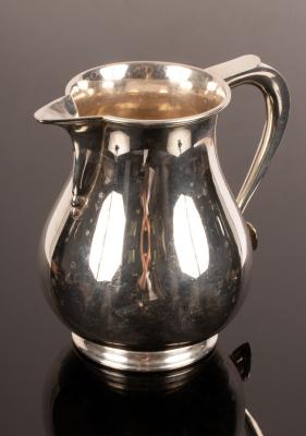 Appraisal: A Georgian style silver beer jug Edward Barnard Sons London